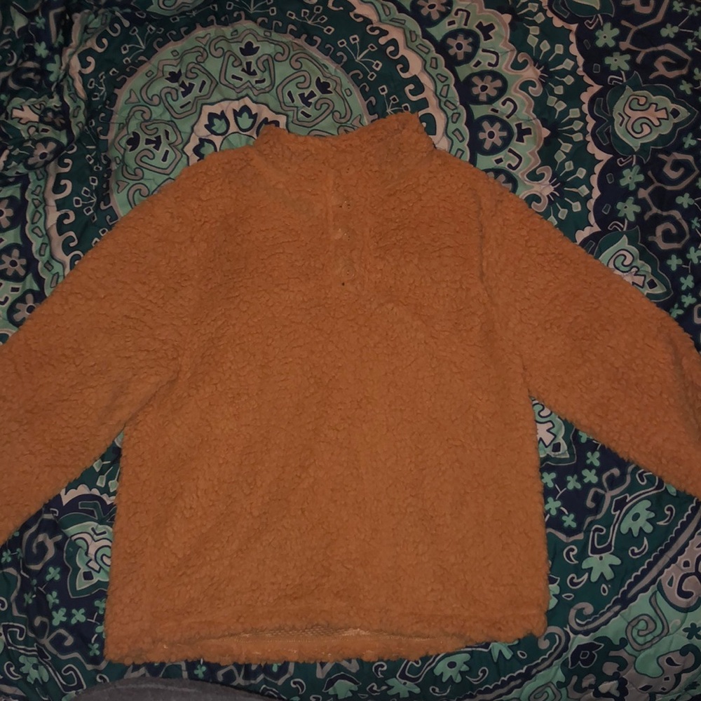 Orange fleece sweater with thin material inside. Size women’s XL